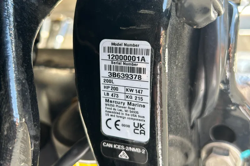 Slide: The Image of Label on Mercury Marine engine, model 200L, 200 HP, for Sun Tracker Party Barge 22 RF XP3. - 115