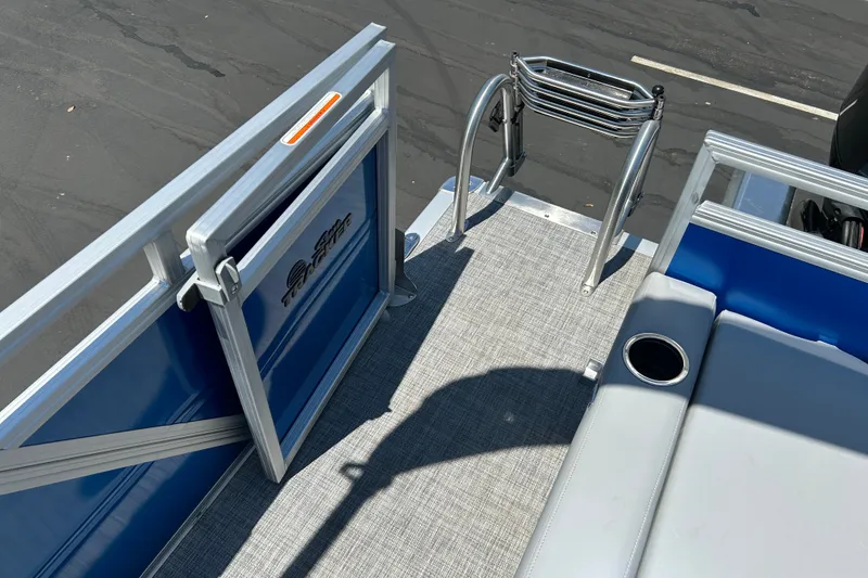 Slide: The Image of 2026 Sun Tracker Party Barge 22 RF XP3 deck with seating and swim ladder. - 19