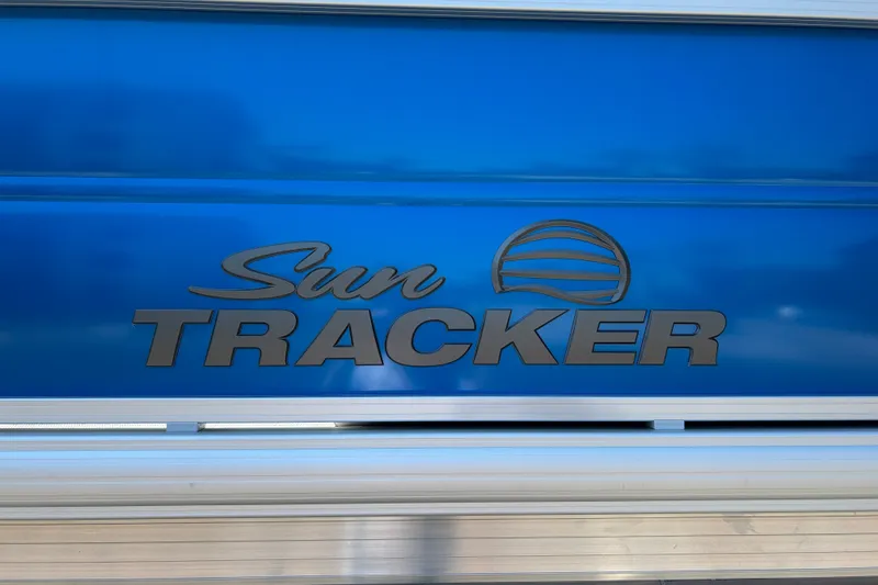 Slide: The Image of 2026 Sun Tracker Party Barge 22 RF XP3 logo on blue background. - 29