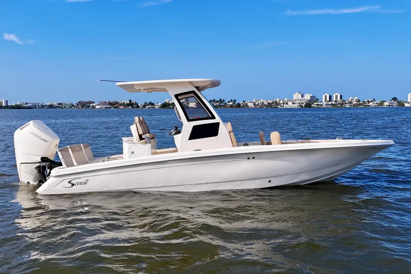 The Image of 2026 Scout 261 XSS boat on water, featuring sleek design and powerful Mercury engine. - 12