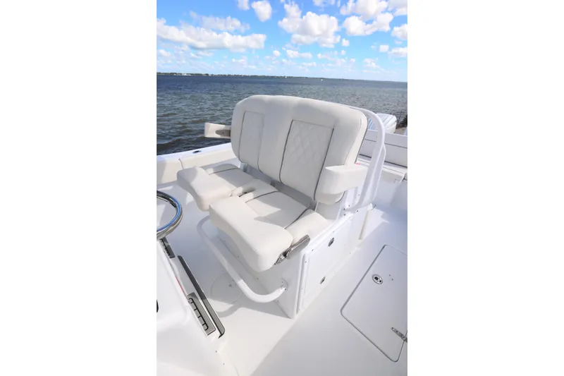 Slide: The Image of Luxury seating on 2026 Sea Hunt Ultra 275 Coffin Box boat, ocean view. - 20