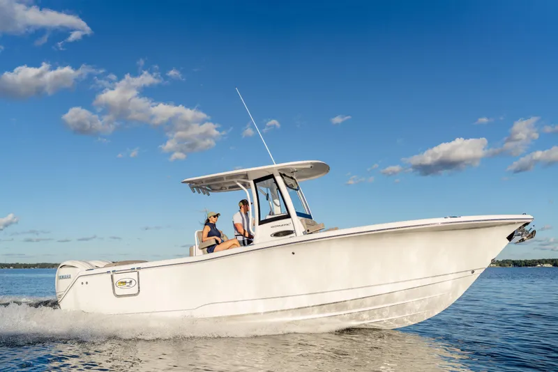 Slide: The Image of 2026 Sea Hunt Ultra 275 Coffin Box boat cruising on a sunny day. - 64