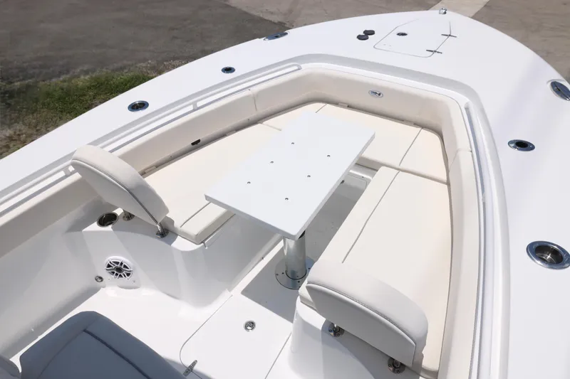 Slide: The Image of Interior view of 2027 Sea Hunt Gamefish 25 boat with seating and table. - 19