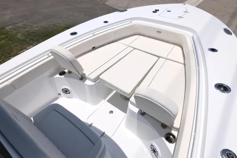 Slide: The Image of 2027 Sea Hunt Gamefish 25 boat interior with cushioned seating and sleek design. - 3