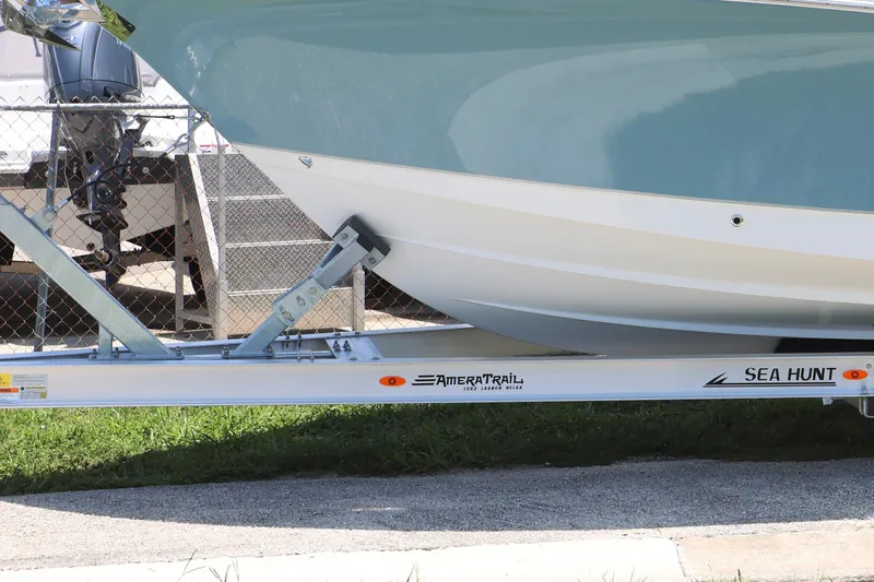 Slide: The Image of 2027 Sea Hunt Gamefish 25 boat on AmeraTrail trailer, side view. - 4