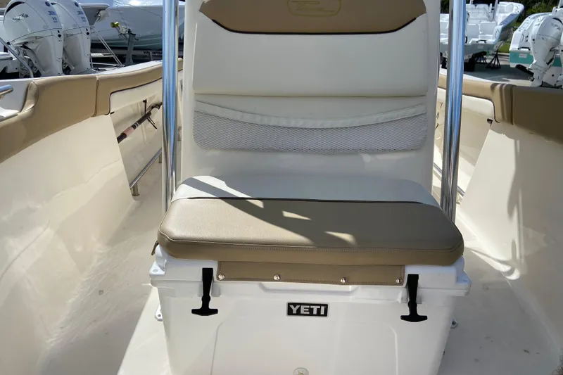 Slide: The Image of 2016 Pioneer 197 Sportfish boat interior with Yeti cooler seat. - 27