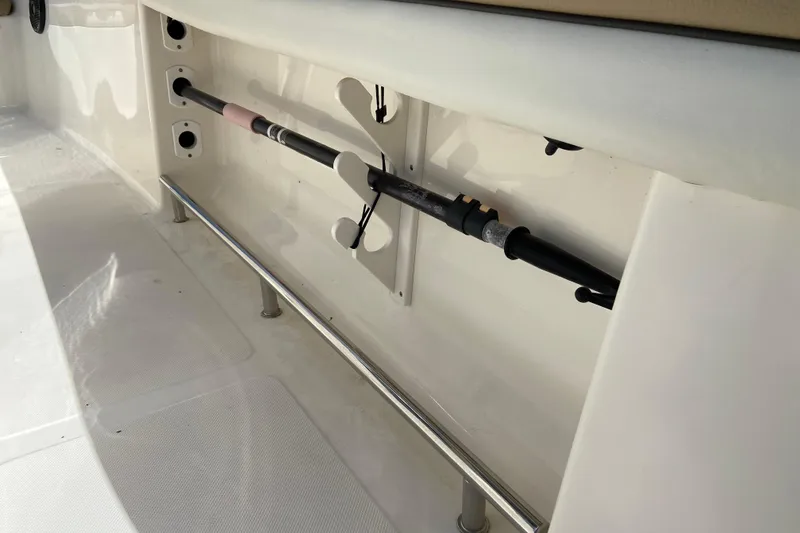 Slide: The Image of Fishing rod holder on a 2016 Pioneer 197 Sportfish boat interior. - 19