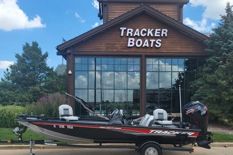 The Image of 2018 Tracker Pro Team 190 TX boat displayed outside Tracker Boats showroom. - 1