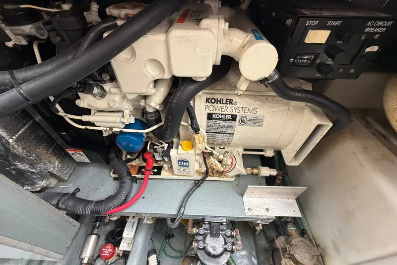 Slide: The Image of Engine compartment of a 2004 Sea Ray Sundancer 280 with Kohler power systems. - 22