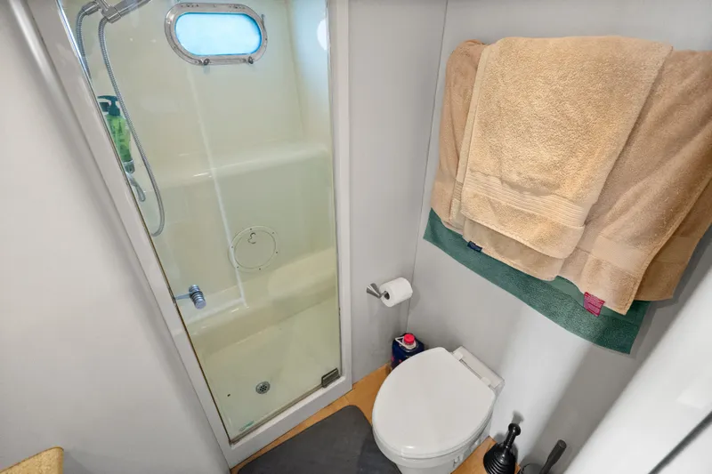 Slide: The Image of Bathroom in 2004 Cheoy Lee Flybridge yacht with shower and toilet. - 42