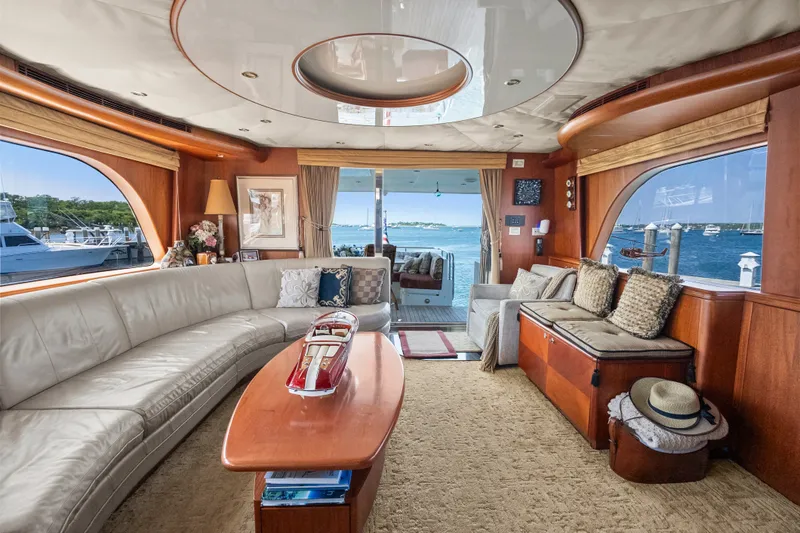 Slide: The Image of Luxurious 2004 Cheoy Lee Flybridge yacht interior with elegant seating and ocean view. - 20