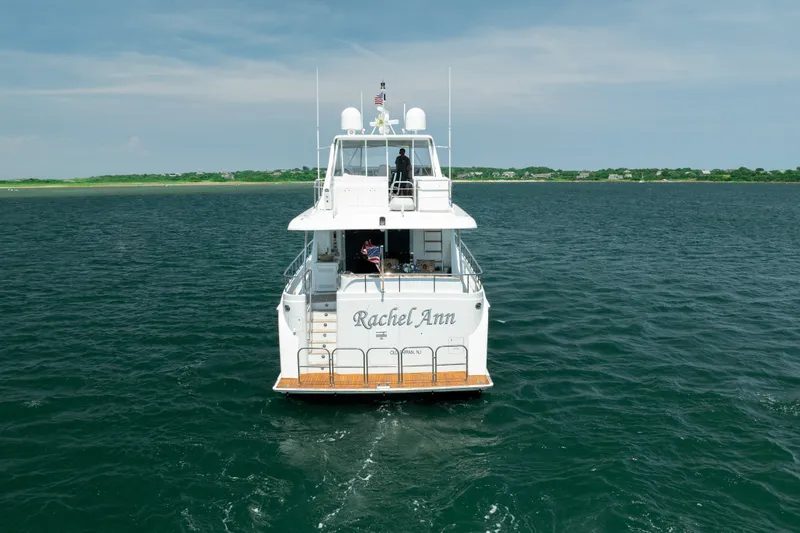 Slide: The Image of 2004 Cheoy Lee Flybridge yacht "Rachel Ann" cruising on open water. - 5