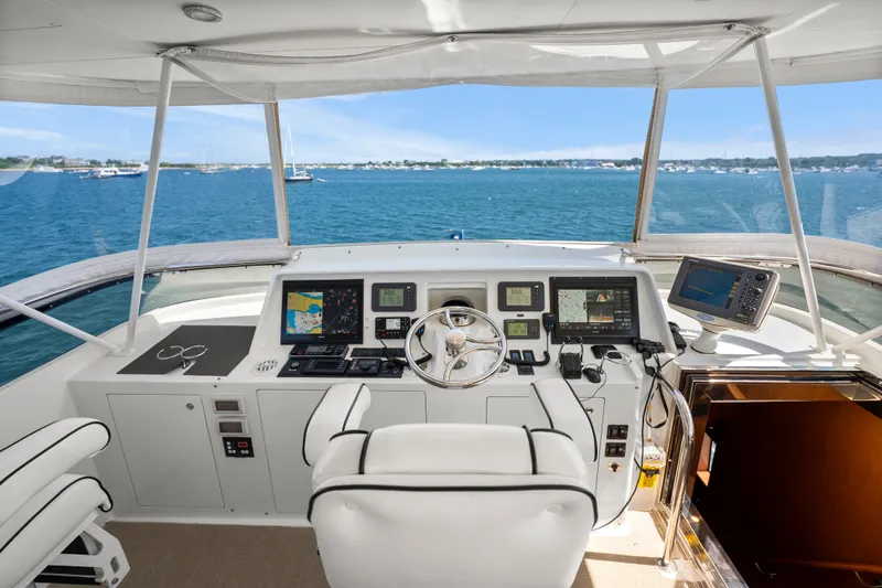 Slide: The Image of Luxurious 2004 Cheoy Lee Flybridge yacht helm with navigation equipment and ocean view. - 17