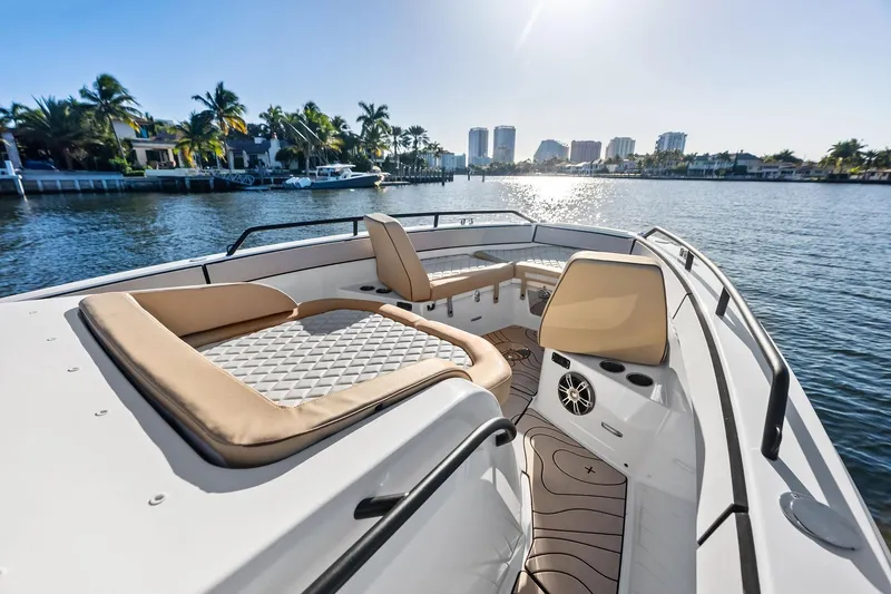 Slide: The Image of Luxurious Zodiac X10CC 2025 boat interior with plush seating, cruising on a sunny waterfront. - 41