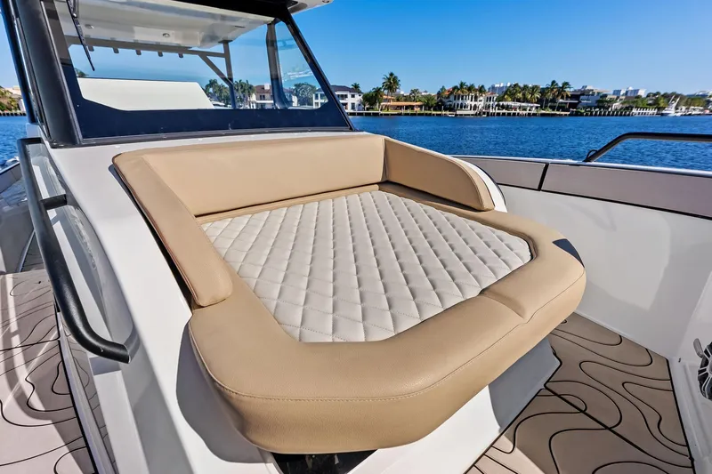 Slide: The Image of Luxurious seating on Zodiac X10CC 2025 boat, with waterfront view. - 43