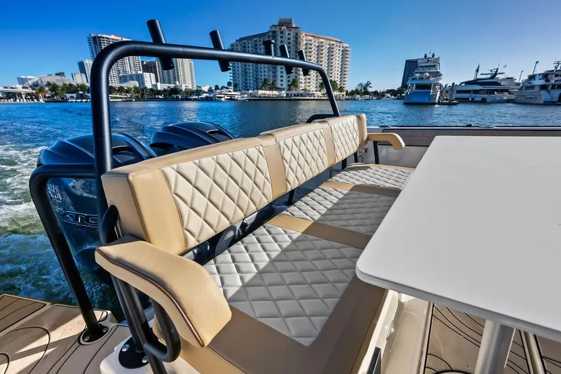 Slide: The Image of 2025 Zodiac X10CC boat interior with luxurious seating and waterfront view. - 25