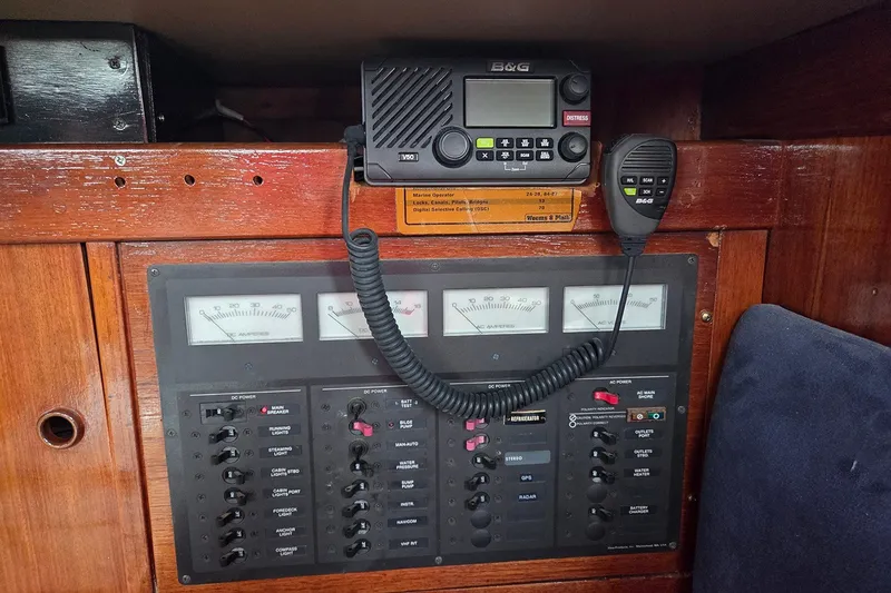 Slide: The Image of Electrical control panel and radio equipment on a 1983 Sabre 38 sailboat. - 22
