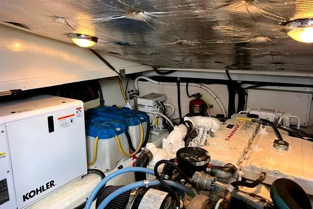 Slide: The Image of Engine room of 2008 Back Cove 33 boat with Kohler generator and marine equipment. - 19
