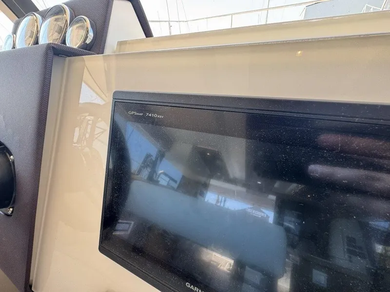 Slide: The Image of The image shows a GPS navigation system on a 2016 Fountaine Pajot Motor Yacht 37. - 17