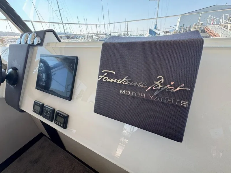 Slide: The Image of The image shows the helm of a 2016 Fountaine Pajot Motor Yacht 37. - 15