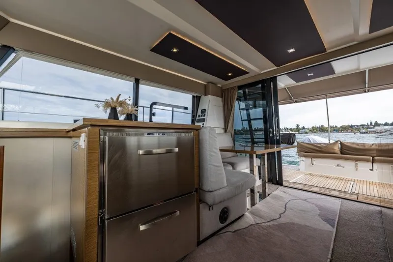 Slide: The Image of Interior of a 2016 Fountaine Pajot Motor Yacht 37 with modern design and water view. - 17