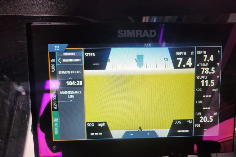 Slide: The Image of Simrad display on 2022 Sea Ray SPX 210 Outboard showing depth and engine hours. - 5