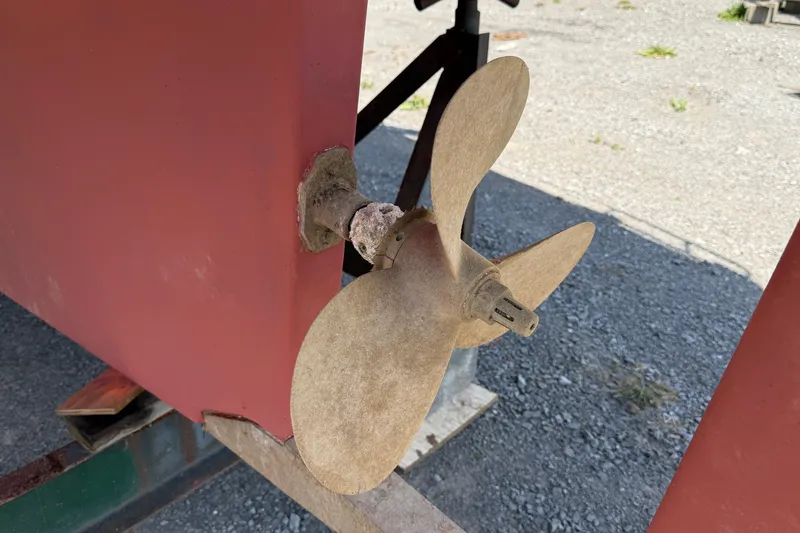 Slide: The Image of Propeller of a 2000 Island Packet 320 sailboat on dry dock. - 16