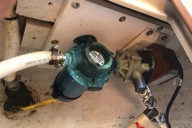 Slide: The Image of Boat engine compartment with pump system, Island Packet 320, 2000 model. - 89