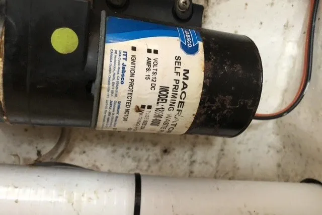 Slide: The Image of Self-priming macerator pump in Island Packet 320, 2000 model boat. - 92