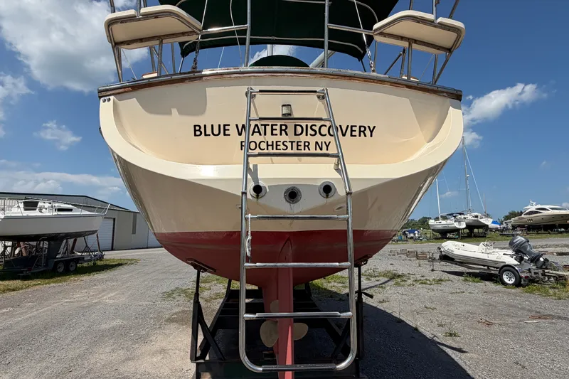 Slide: The Image of Island Packet 320 sailboat, 2000 model, named "Blue Water Discovery," on dry dock in Rochester, NY. - 13