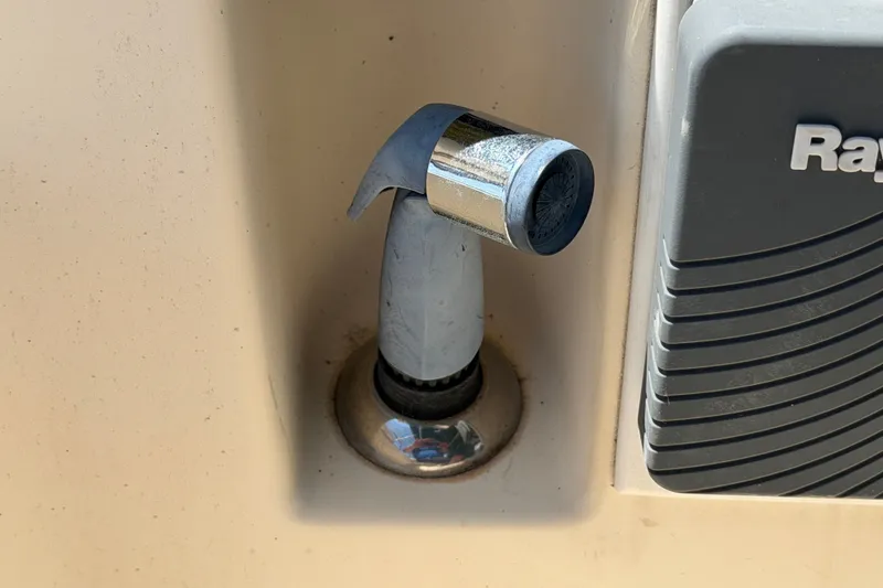 Slide: The Image of Boat deck fitting on 2000 Island Packet 320, near a Rapala device. - 43