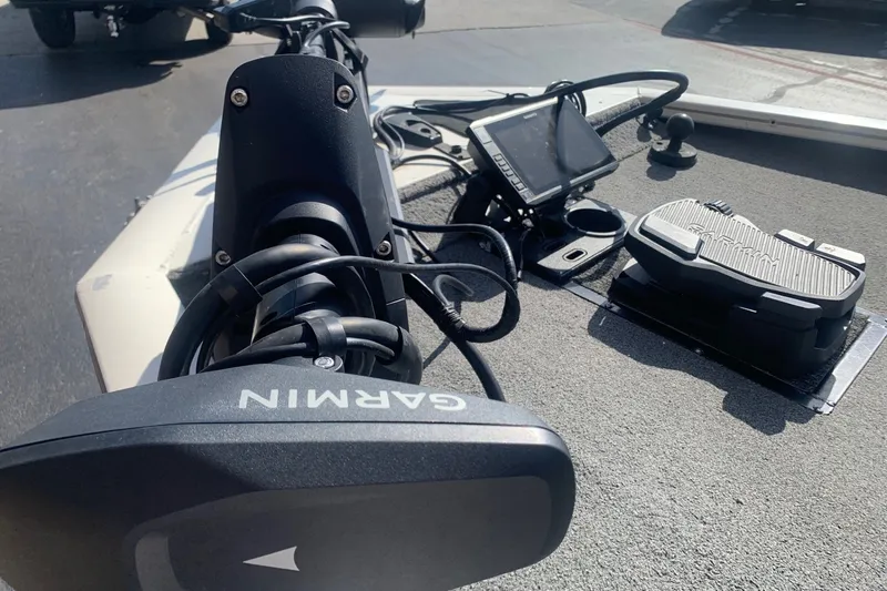 Slide: The Image of 2018 Tracker Pro Team 195 TXW boat with Garmin navigation system and foot pedal controls. - 3