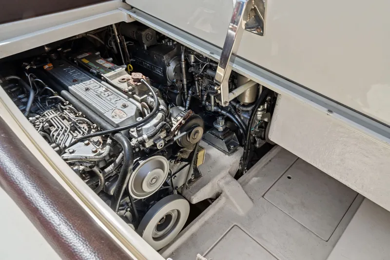 Slide: The Image of Engine compartment of a 2006 Riva 33' Aquariva boat, showcasing detailed mechanics. - 20