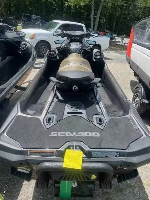 Slide: The Image of A 2022 Sea-Doo GTX 170 SS iDF on a trailer, surrounded by cars. - 4