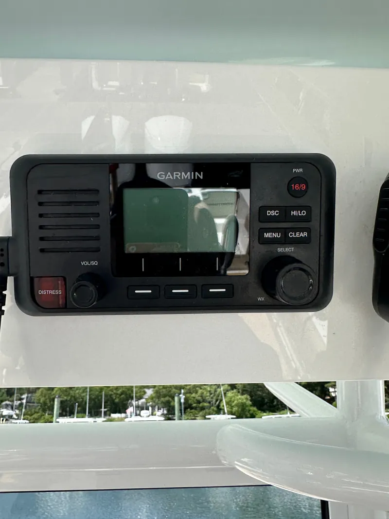 Slide: The Image of A Garmin control panel on a 2019 Sportsman Open 282 Center Console boat. - 11