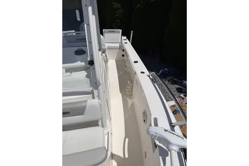 Slide: The Image of 2013 Everglades 210 Center Console boat interior with Minn Kota trolling motor. - 12