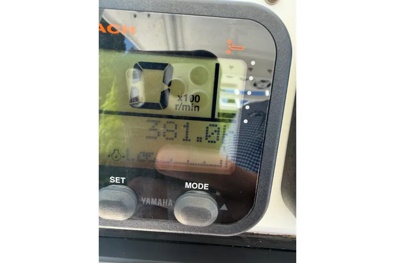 Slide: The Image of Close-up of a Yamaha boat tachometer displaying 381.0 hours on an Everglades 210 Center Console. - 27