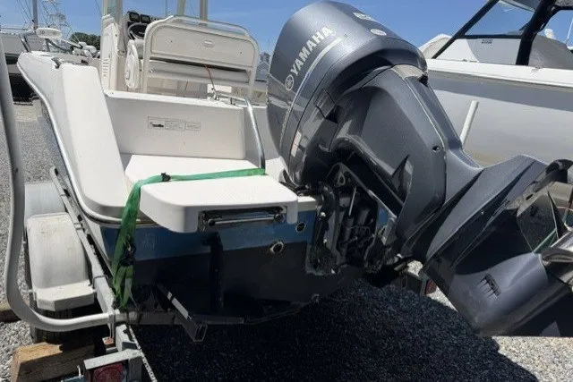 Slide: The Image of 2013 Everglades 210 Center Console boat with Yamaha outboard motor on trailer. - 4