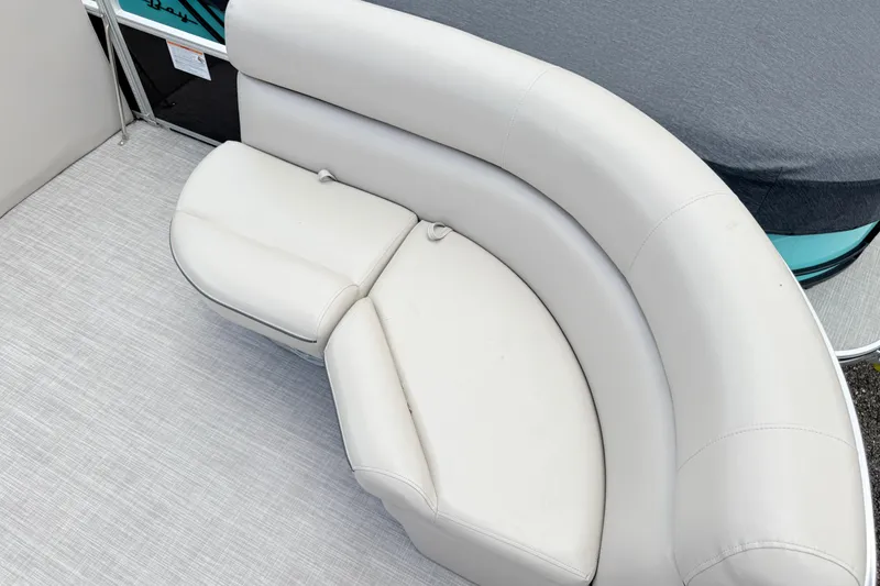 Slide: The Image of Luxurious seating on 2019 South Bay 520CR pontoon boat, featuring elegant curved design. - 7
