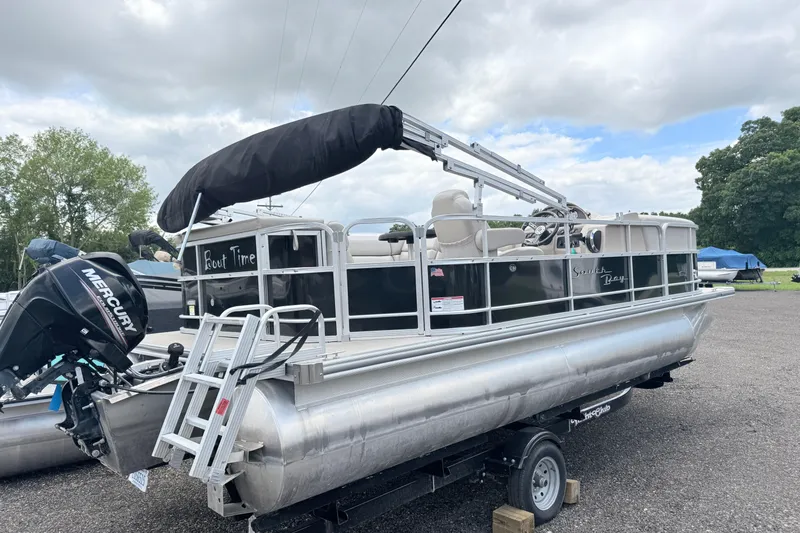 Slide: The Image of 2019 South Bay 520CR pontoon boat with Mercury engine on a trailer. - 1
