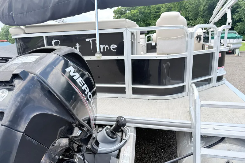 Slide: The Image of 2019 South Bay 520CR pontoon boat with Mercury engine, docked outdoors. - 4