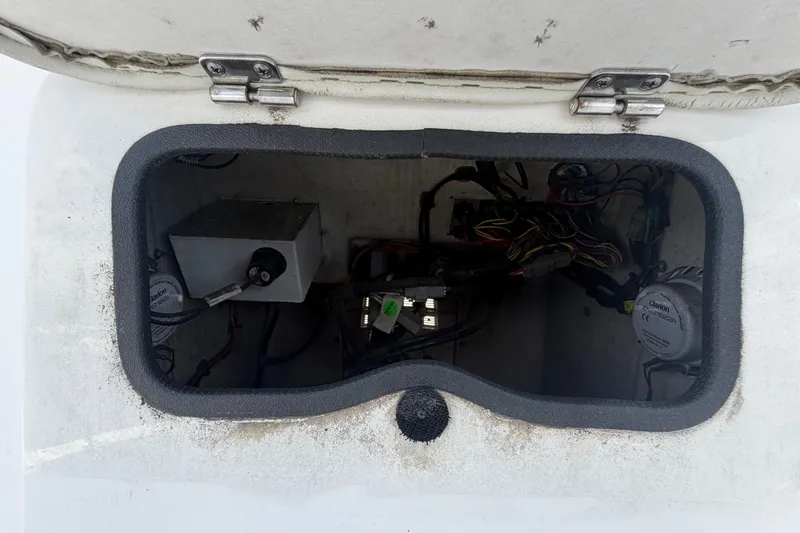 Slide: The Image of 2019 Sea Born SV19 Bay boat electrical compartment with wiring and components. - 40