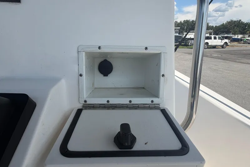 Slide: The Image of 2019 Sea Born SV19 Bay boat storage compartment with open lid and handle. - 20