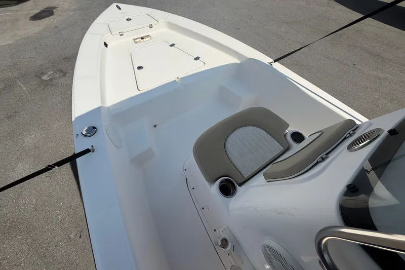 Slide: The Image of 2019 Sea Born SV19 Bay boat interior with seating and storage compartments. - 24