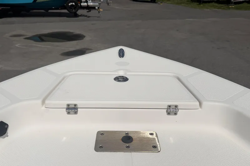 Slide: The Image of 2019 Sea Born SV19 Bay boat deck with storage compartment and metal plate. - 29