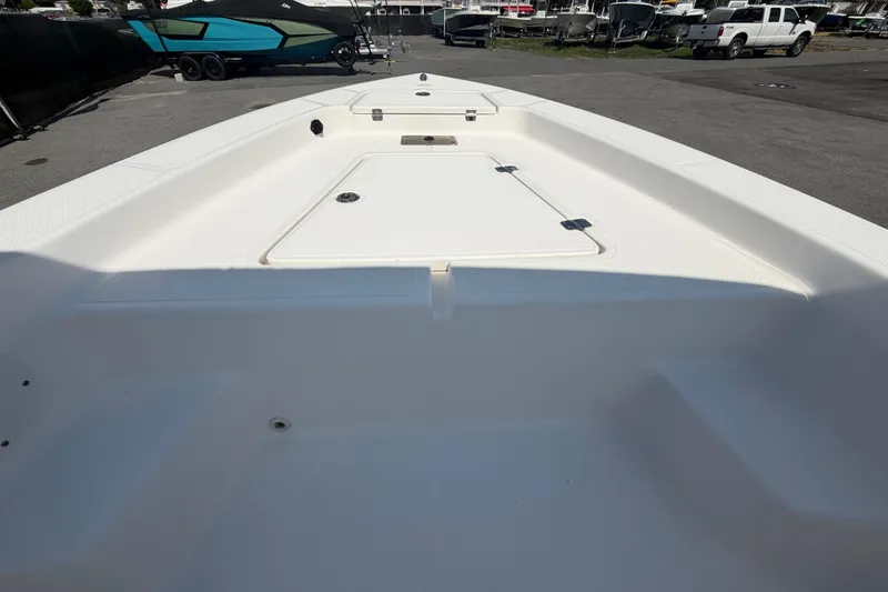 Slide: The Image of 2019 Sea Born SV19 Bay boat interior, showcasing spacious deck and storage compartments. - 26