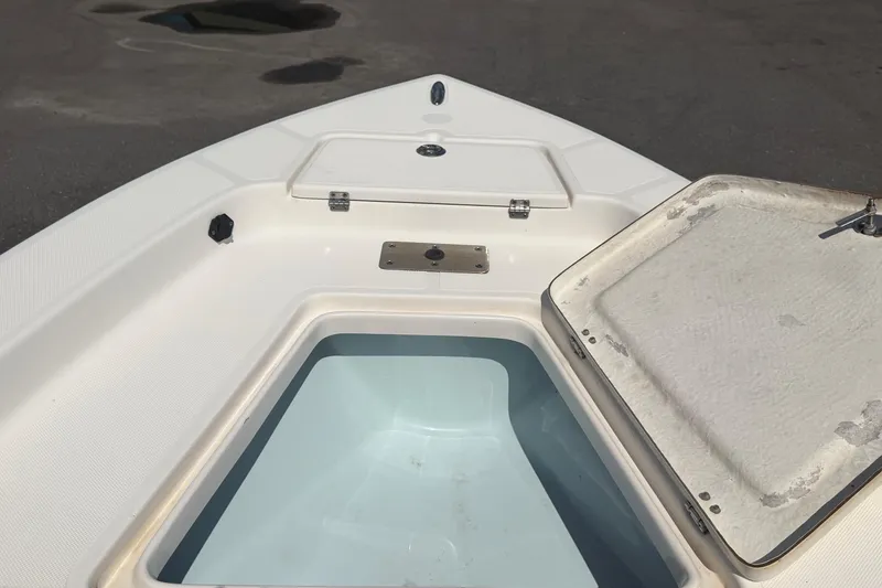 Slide: The Image of 2019 Sea Born SV19 Bay boat interior with open storage compartment. - 28