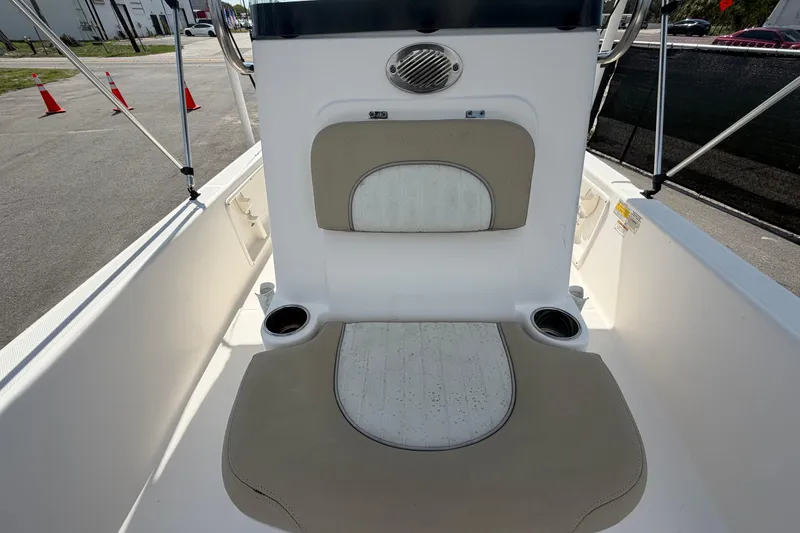 Slide: The Image of 2019 Sea Born SV19 Bay boat interior with cushioned seating and cup holders. - 37