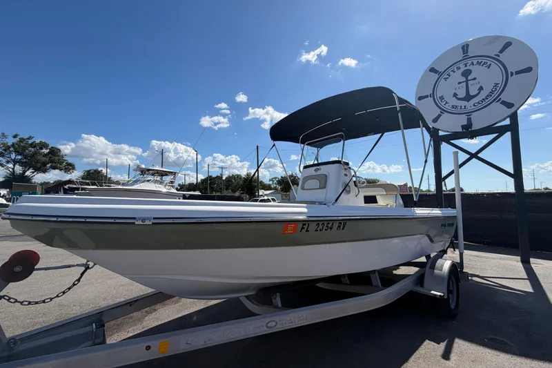 The Image of 2019 Sea Born SV19 Bay boat on trailer under clear blue sky. - 0