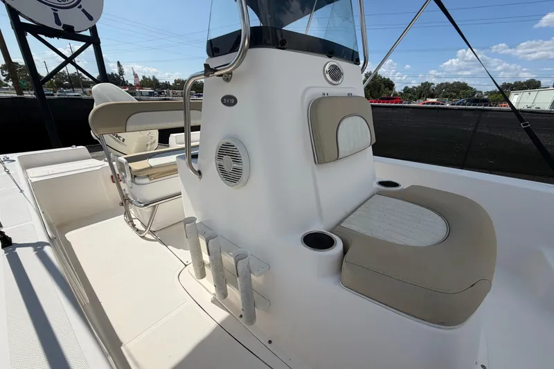 Slide: The Image of 2019 Sea Born SV19 Bay boat interior with seating and console details. - 43
